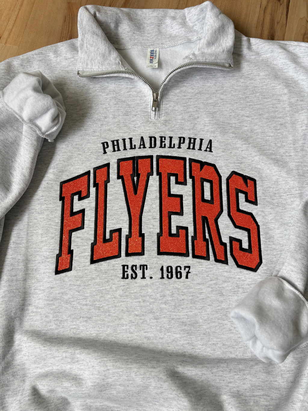Flyers Quarter Zip Sweatshirt with Embroidered Glitter Applique