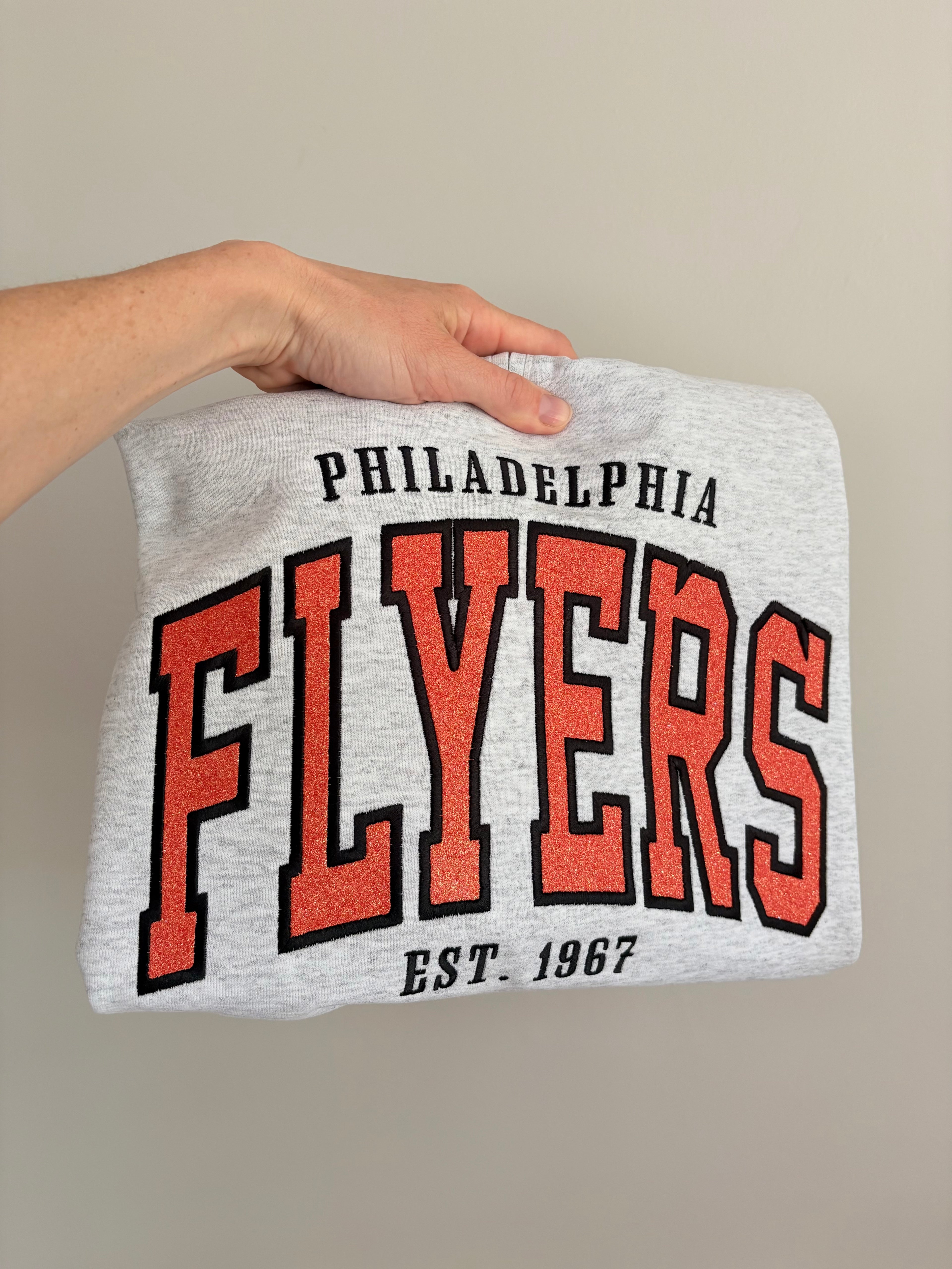 Flyers Quarter Zip Sweatshirt with Embroidered Glitter Applique