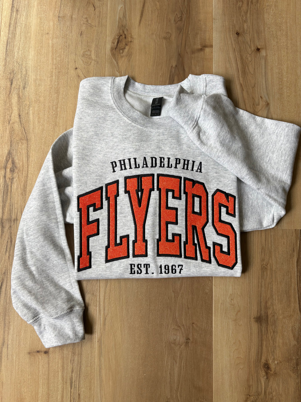 Flyers Quarter Zip Sweatshirt with Embroidered Glitter Applique