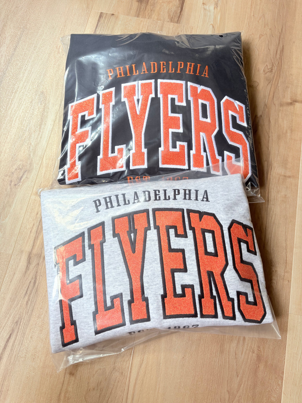 Flyers Quarter Zip Sweatshirt with Embroidered Glitter Applique