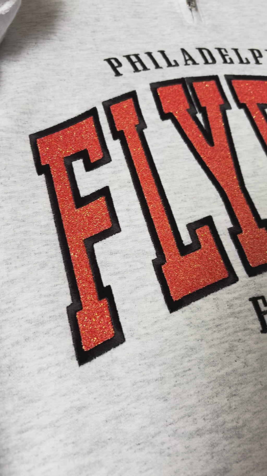 Flyers Quarter Zip Sweatshirt with Embroidered Glitter Applique